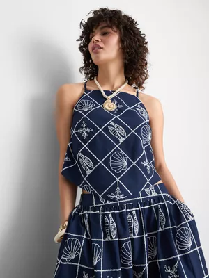 Blusa de algodón troquelada con escote halter