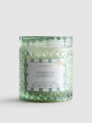 Vela perfumada en tarro de vidrio con textura