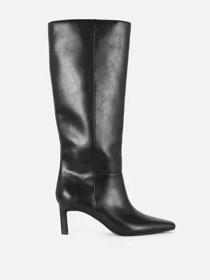 Botas de tacón hasta la rodilla de Paula Echevarría