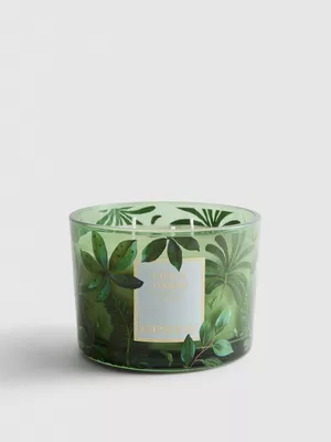 Vela aromática en frasco de vidrio decorativo