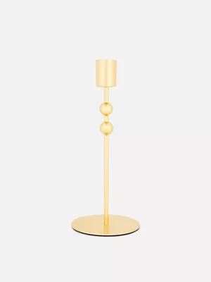 Candelabro metalizado con detalle de cuentas