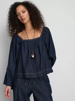 Top vaquero de manga abullonada de Paula Echevarría