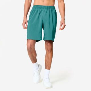 DOMYOS Pantaloncini uomo palestra regular fit traspiranti con tasche con zip verdi
