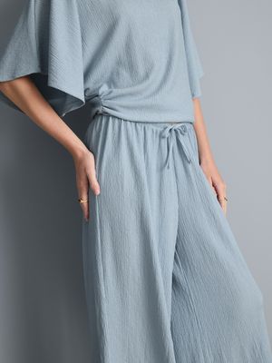 Pantalones de pernera ancha con efecto fruncido