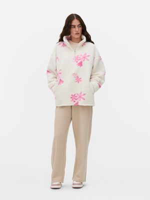 Forro polar de borreguito con media cremallera