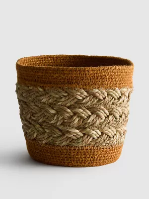 Cesta trenzada de almacenamiento