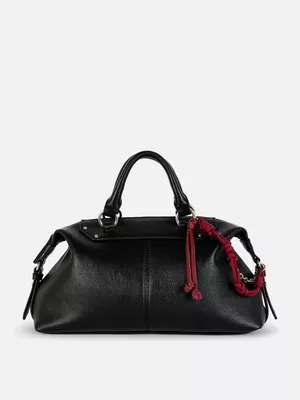 Bolso bowling con colgante de Rita Ora