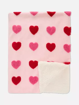 Manta con corazones de bouclé