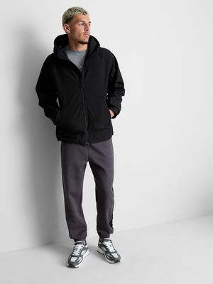 Chaqueta deportiva con capucha y cremallera