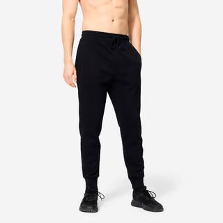 DOMYOS Pantaloni tuta uomo slim fit felpati con tasche con zip neri