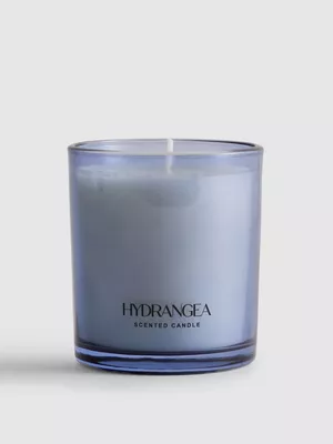 Vela aromática floral en tarro