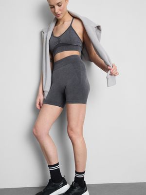 Pantalones cortos sin costuras con lavado ácido