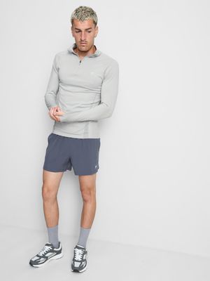 Camiseta deportiva con cremallera de 1/4