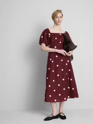 Vestido midi de lino con mangas abullonadas The Edit