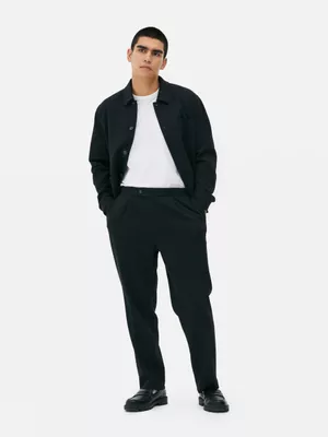 Pantalones de corte entallado de punto