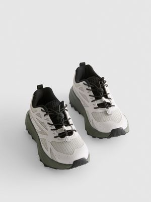 Zapatillas deportivas con suela gruesa y muletillas