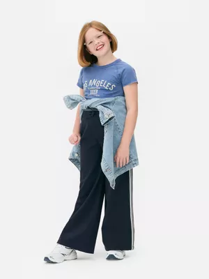Joggers de pernera ancha con rayas laterales