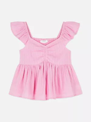 Blusa fruncida con volantes