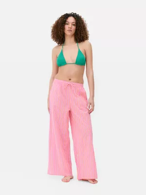 Pantalones playeros anchos con cordón de ajuste