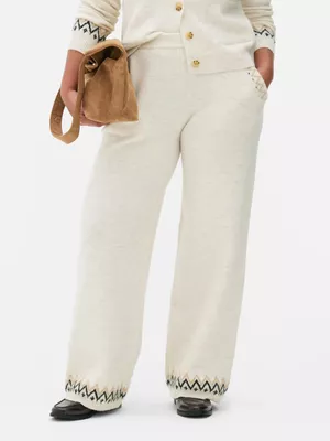 Pantalones navideños anchos con grecas alpinas