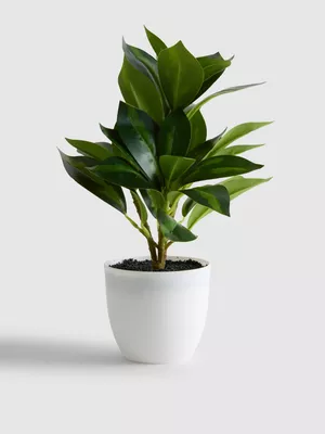 Planta artificial en recipiente de cerámica