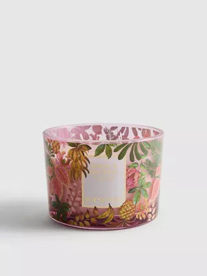 Vela aromática en frasco de vidrio decorativo