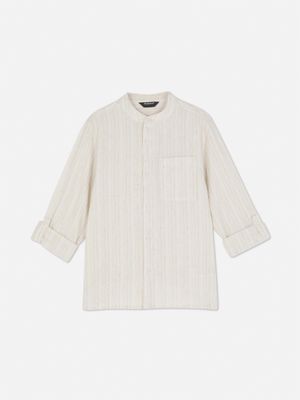 Camisa con cuello panadero y mangas enrolladas