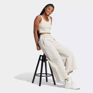 ADIDAS Pantaloni tuta ADIDAS donna ESSENTIALS flare con tasca grigi